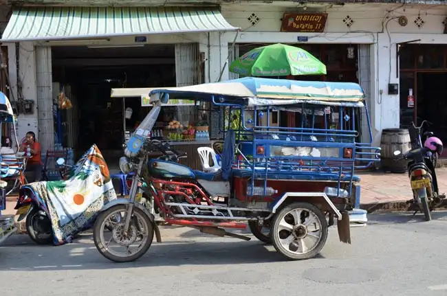 The iconic vehicle on the streets of Laos a.k.a. Tuk-tuk | Location: Luang Prabang,  Laos