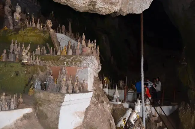 Pak Ou Caves by Mekong river, filled with many miniature Buddha sculptures | Location: Luang Prabang,  Laos