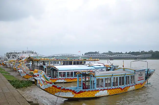 Dragon boats on Perfume River | Location: Hue,  Vietnam